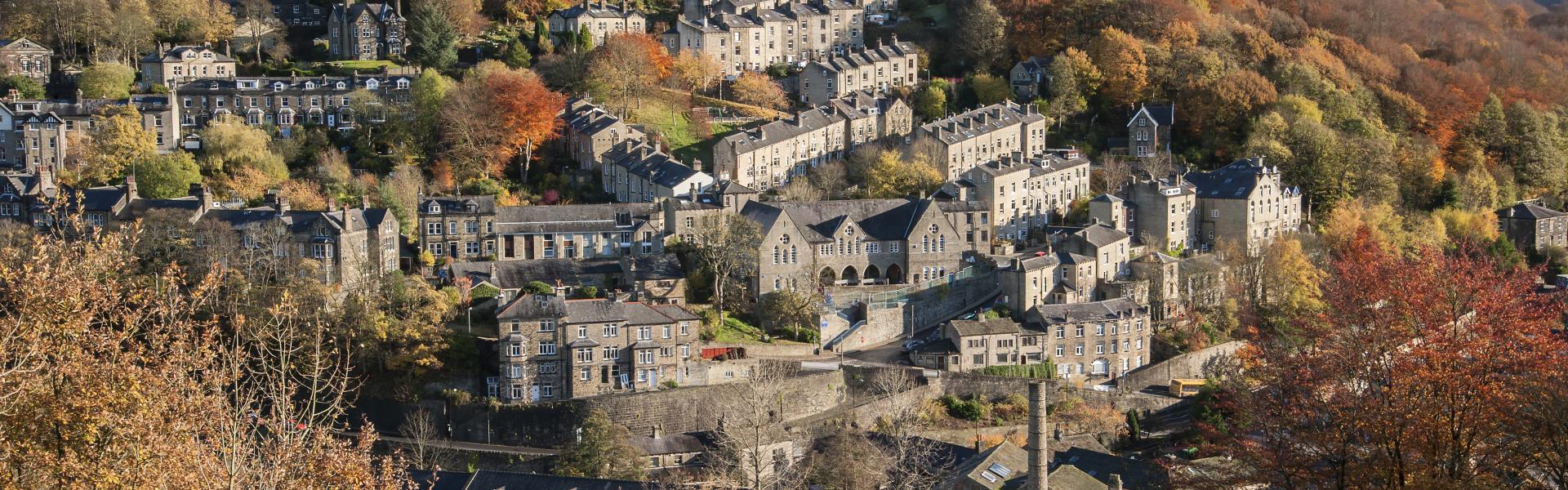 small old town with nature and woods around embedded in hills
