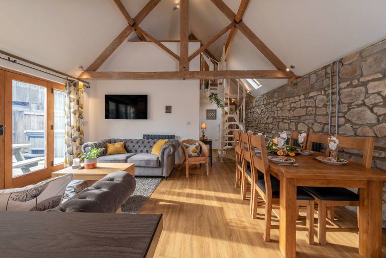 The Barn a 4 star Gold rated luxury converted barn with your own hot tub in beautiful Somerset countryside surroundings on a working cider farm