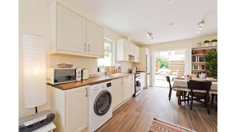 Charming Riverside Apartment Minutes from City