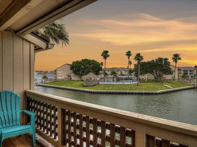 Canal front, 3 bedroom, 3 bath condo, huge patio, right next to the pool!