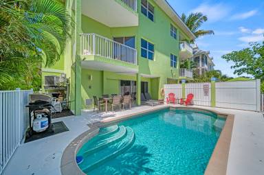 Latitude Adjustment Waterfront Home w/ Private Heated Pool! Walk to Siesta Village & Beach!