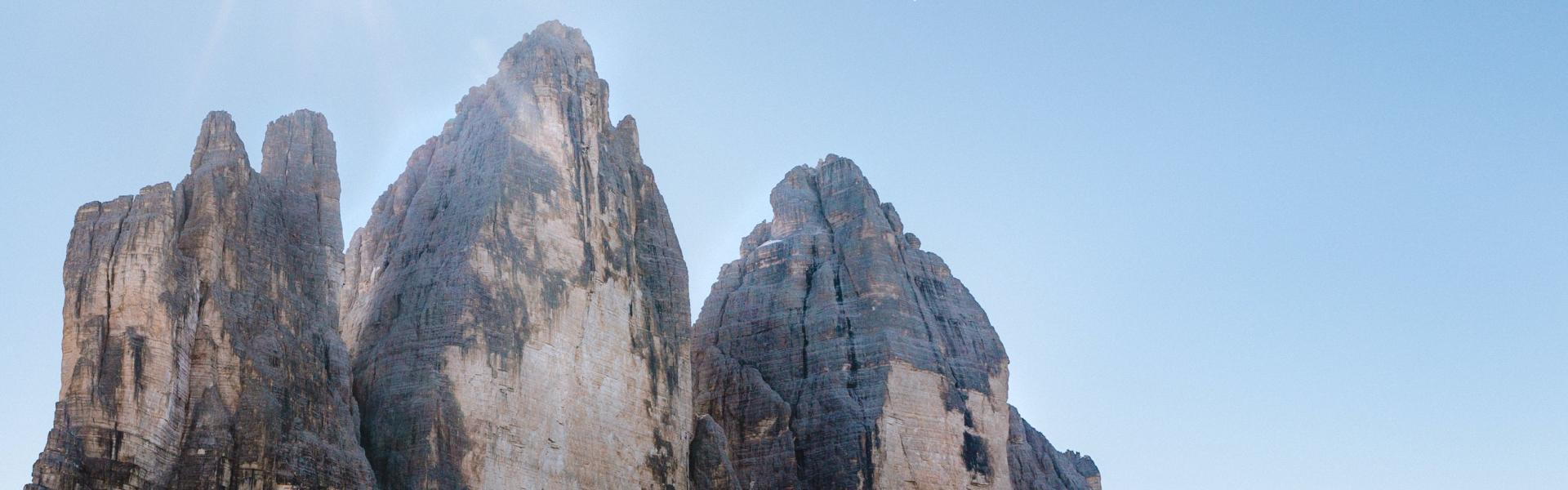 person walking near rocks