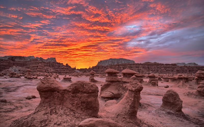 View of rock formations under a dramatic sky at Goblin Valley 