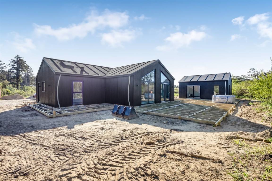 189 m² Ferienhaus ∙ 4 Schlafzimmer ∙ 11 Gäste – Bild 1