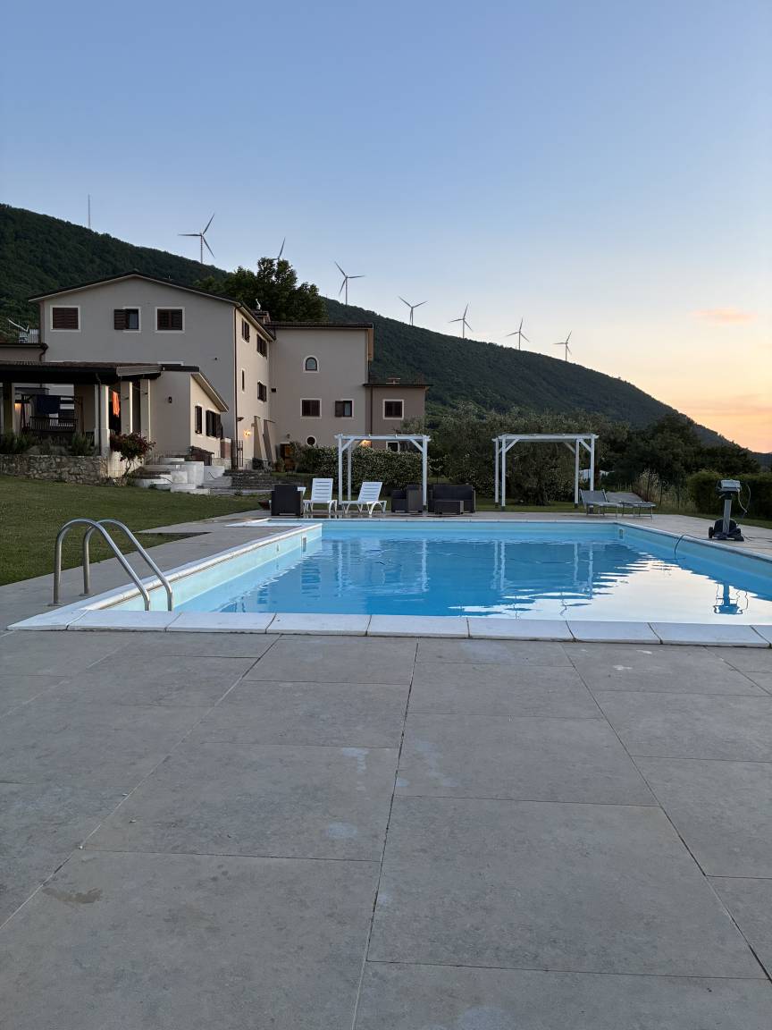 Appartamento Accogliente con Giardino e Piscina Condivisa