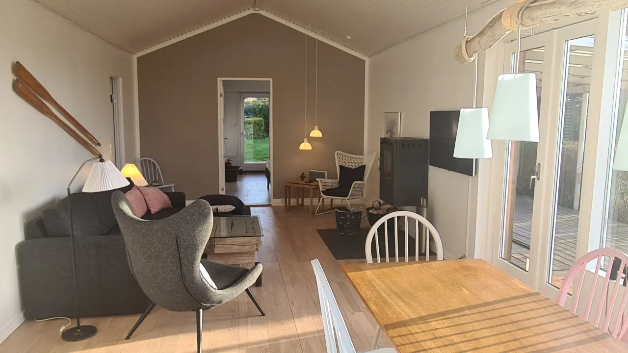 Nature Lodge with waterfront view at Falsters North Coast
