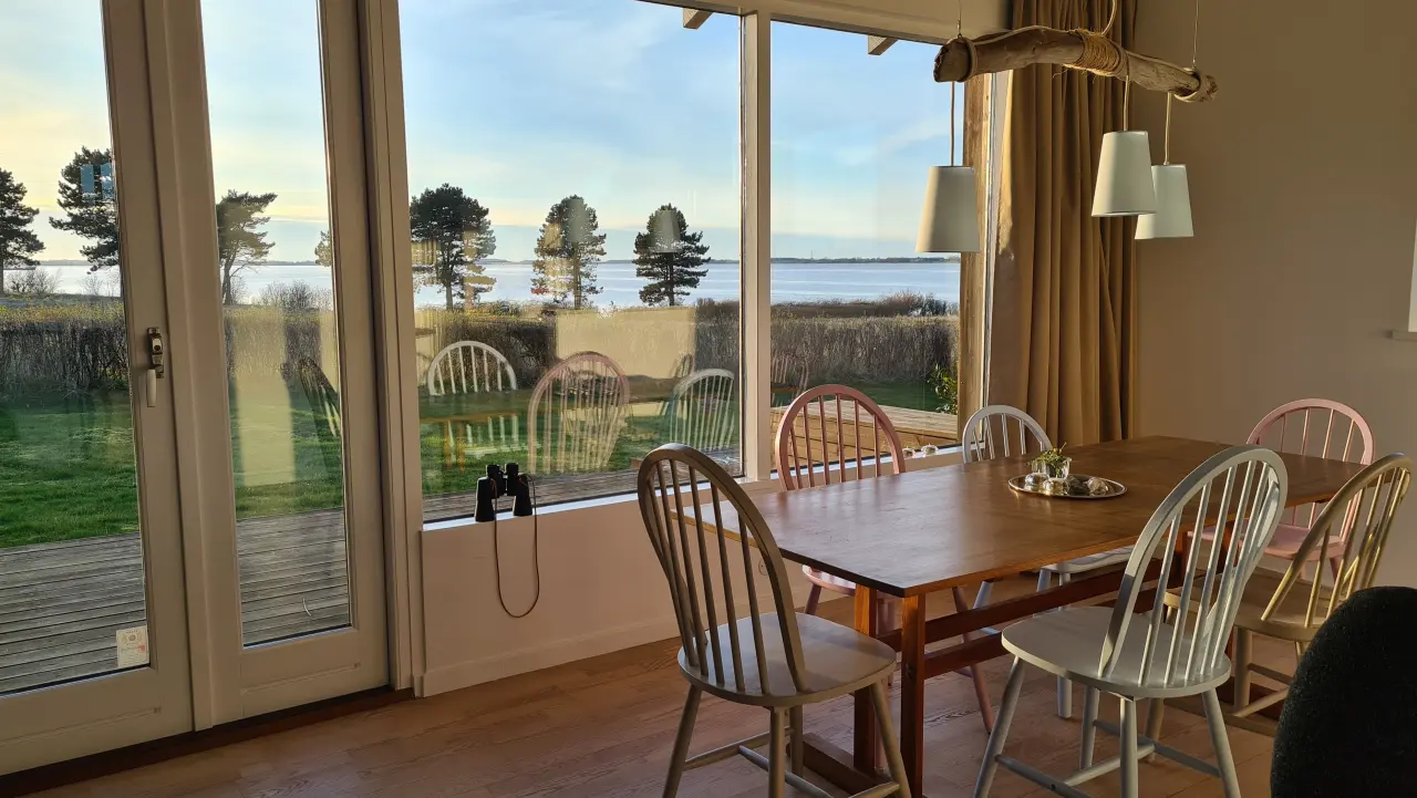 Nature Lodge with waterfront view at Falsters North Coast