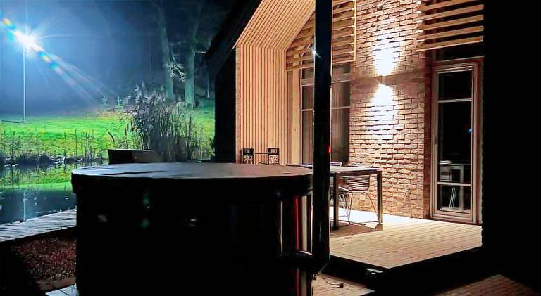 Pleasant lodge with grill, yard & hot tub | Dogs allowed — photo 4