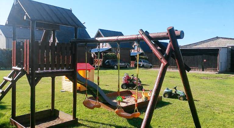 Lovely lodge with garden, patio & grill | Pets are welcome — photo 2