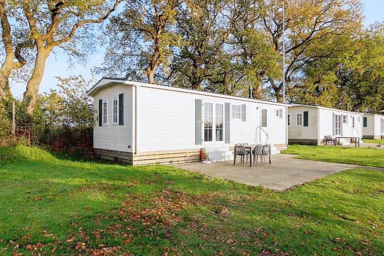 Chalet with garden, patio & heated pool in Borger