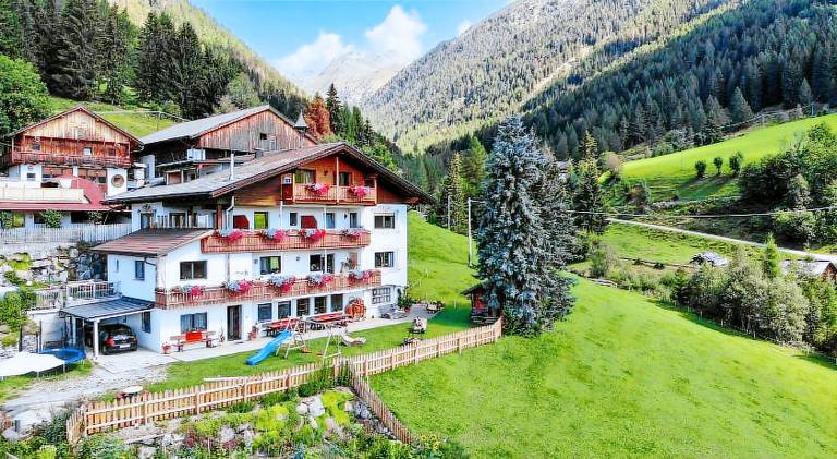 Farm with barbecue, yard & terrace in Terento