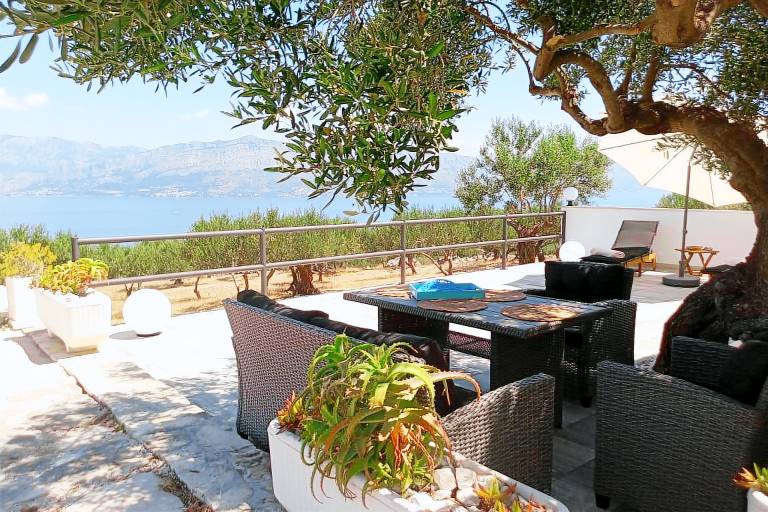 Two bedroom house with terrace and sea view Postira, Brač (K-11742) in Postira