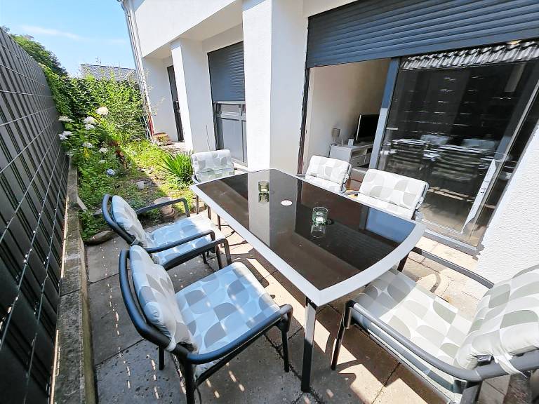 Westwind zentrale Ferienwohnung mit kleinem Garten