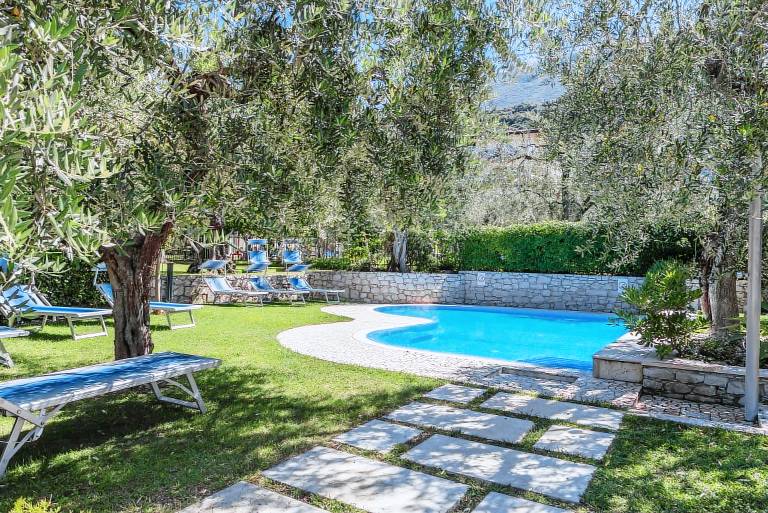 Family-friendly lovely holiday apartment with patio, pool & garden | Mountain view | Close to the beach | Close to the ski | Pet-friendly in Malcesine