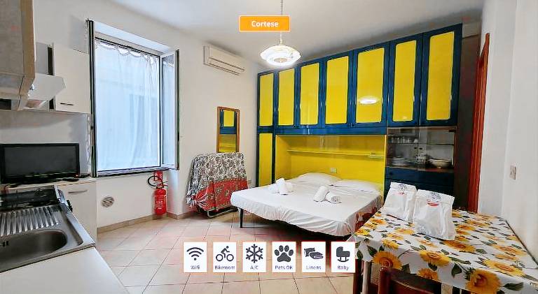 Holiday apartment with patio in Loano