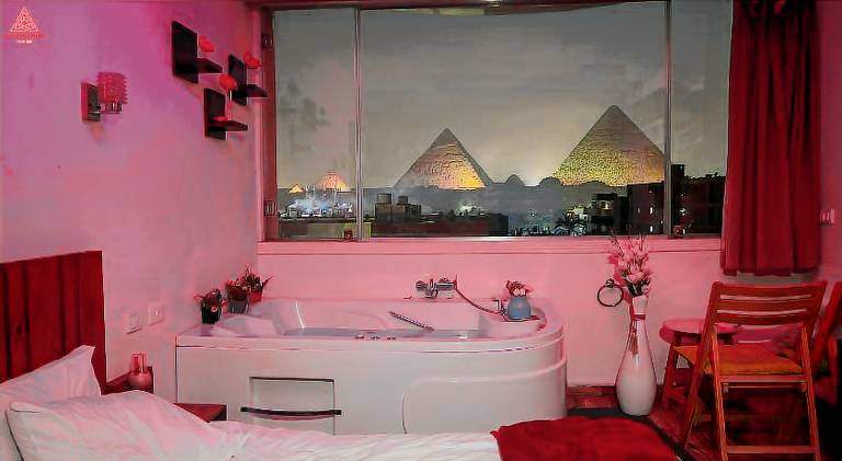 Full Pyramids View with Jacuzzi & Roof Top Access in Giza
