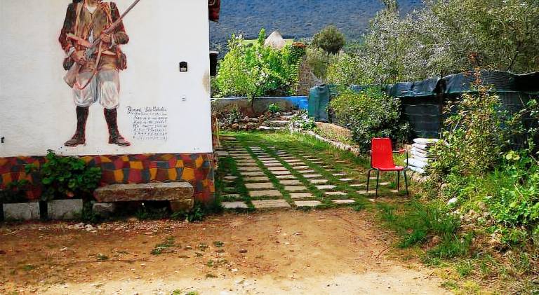 Vacation home with terrace, yard & BBQ in Oliena