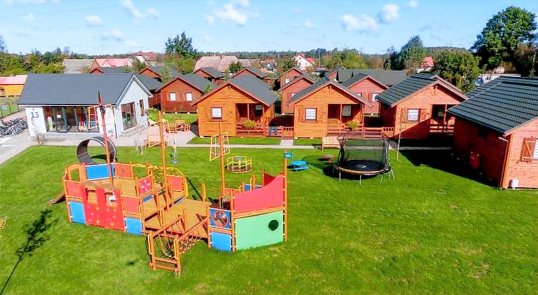Lodge with yard, terrace & barbecue in Darlowo