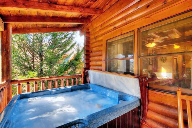 Snuggle Up Cabin by Beyond Expectations with Hot Tub — photo 2