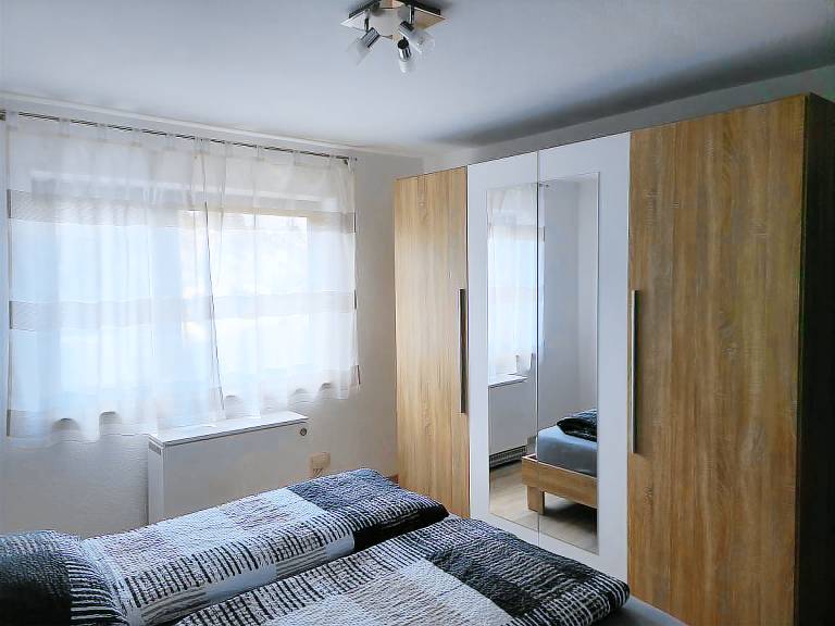 Holiday apartment with yard, terrace & BBQ | Garden view — photo 3