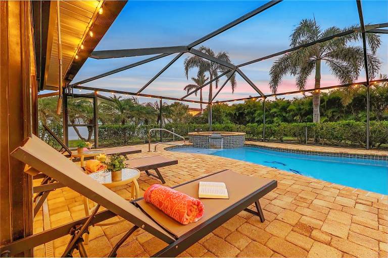 Yacht Club - Walk to Beach, Restaurant/Bar! Heated Saltwater Pool - Villa Beachside Bliss - Roelens in Cape Coral, FL