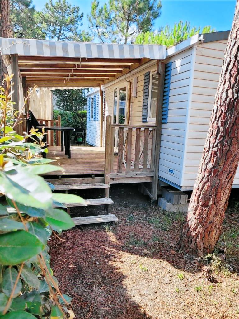 Children-friendly mobile home with grill, pool & patio | Pets are welcome — photo 2