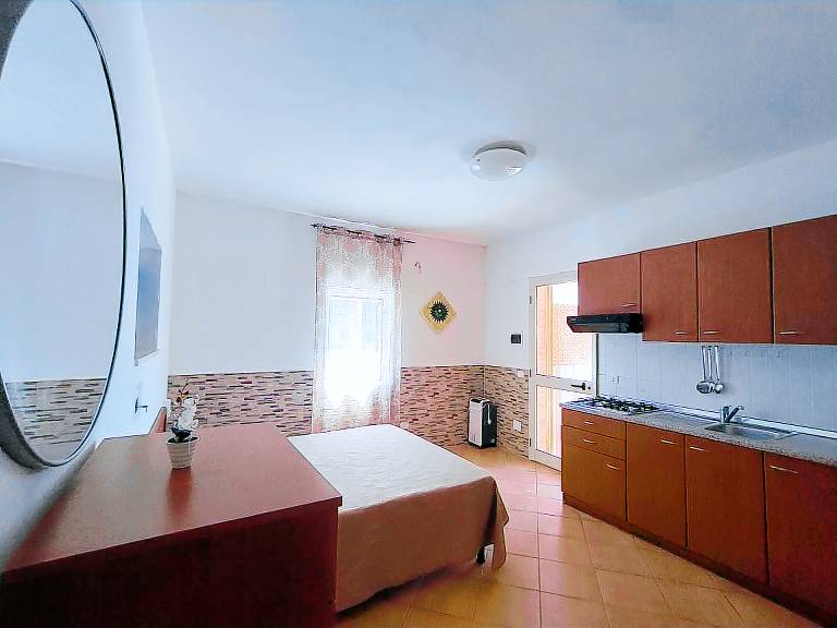 Holiday Home 'Villa Elvira Monolocale' with Private Terrace, Shared Garden and Air Conditioning — photo 5