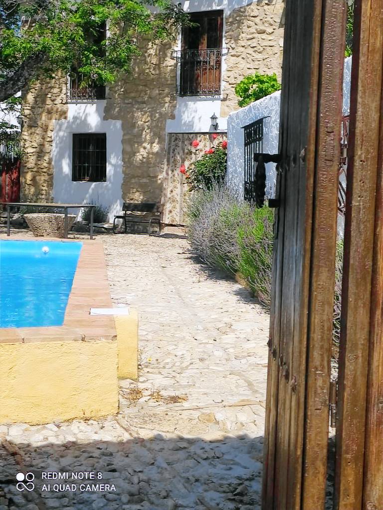Restored mill with private swimming pool on a property in west of Grenada, in Loja