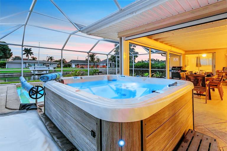 Vacation home with patio, private pool & barbecue | Water view in Cape Coral, FL