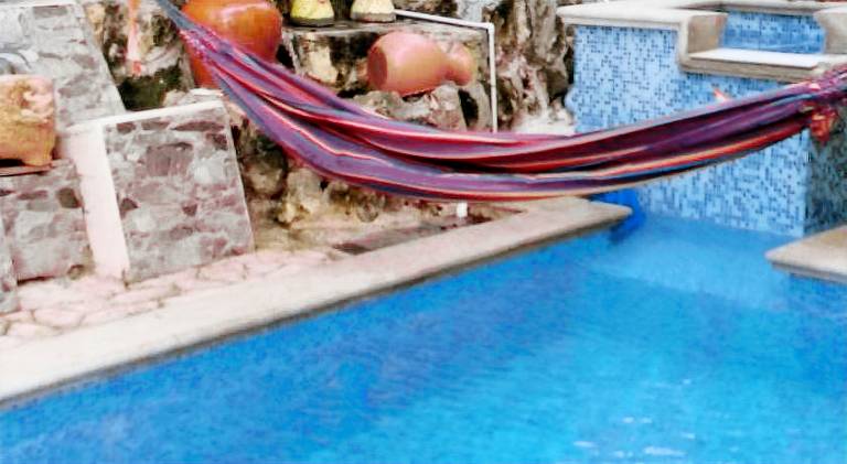 Holiday apartment with terrace, yard & private pool in Puerto Morelos