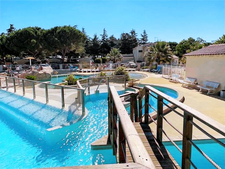 Camping suite with yard, terrace & heated pool | Pet-friendly — photo 2