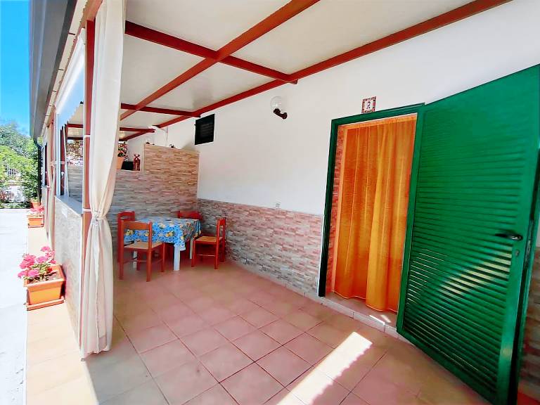 Holiday Home 'Villa Elvira Monolocale' with Private Terrace, Shared Garden and Air Conditioning — photo 2