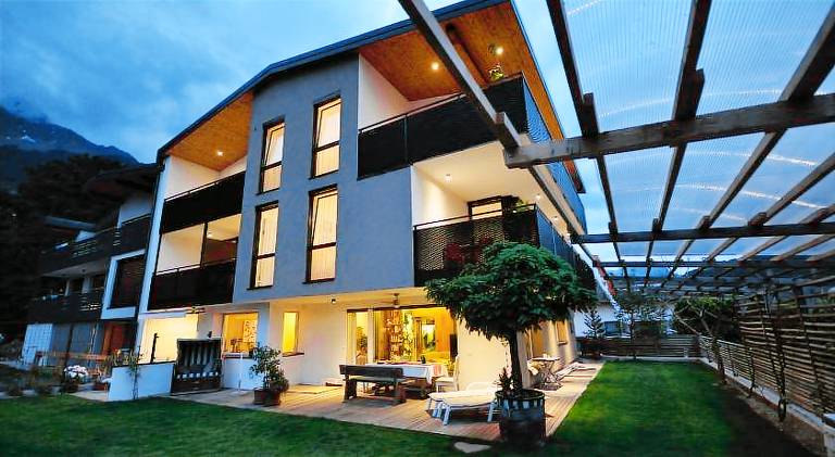 Rental apartment with garden, sauna & patio in Parcines