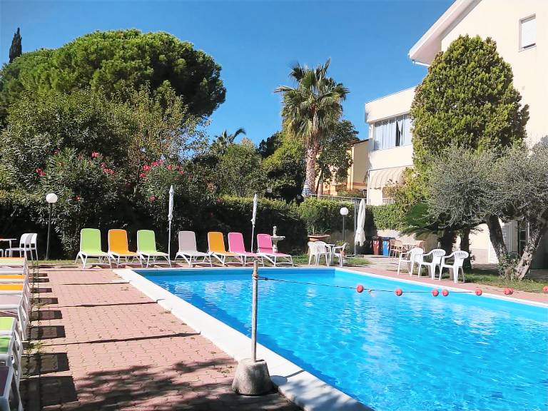 Apartment with garden & pool | Garden view in Loano