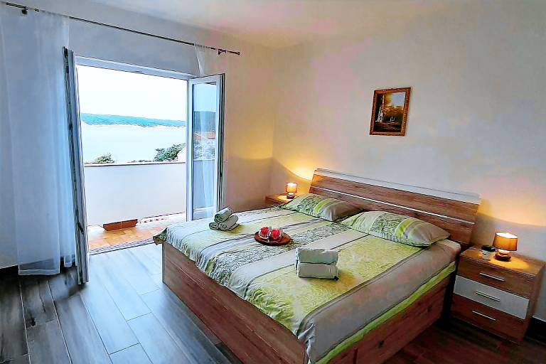 Two bedroom apartment with terrace and sea view Supetarska Draga - Gonar, Rab (A-24383-a) in Rab