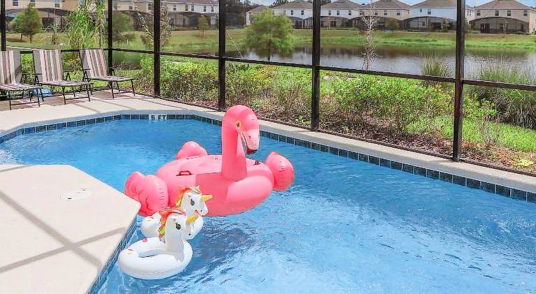 Summer Fun - Waterfront 8BR Home with Private Pool! in Kissimmee, FL