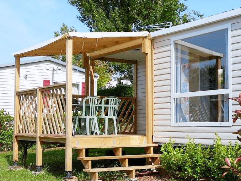 Family-oriented mobile home with terrace & heated pool | Close to the beach | Pets allowed — photo 4