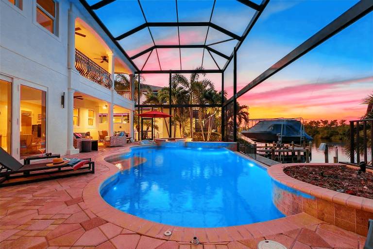 Stunning Sunsets and Waterfront Elegance - Sunset Shore on 28th - Roelens in Cape Coral, FL