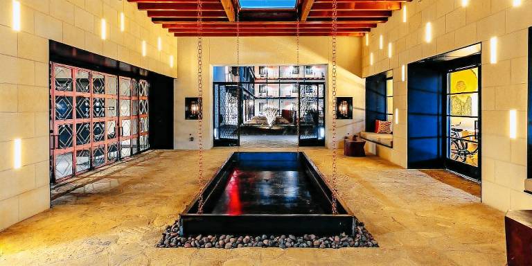 Texican Court by Valencia Hotel Group in Irving, TX