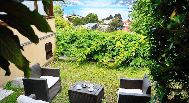 Spacious holiday apartment with yard & patio | Near Tempio Voltiano | Pet-friendly in Brunate