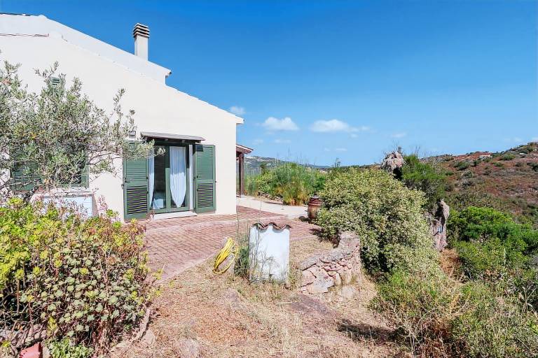 Vacation home with yard, terrace & grill | Mountain view in Olbia