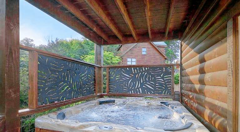 Ample vacation home with hot tub & pool | Dogs allowed in Pigeon Forge, TN