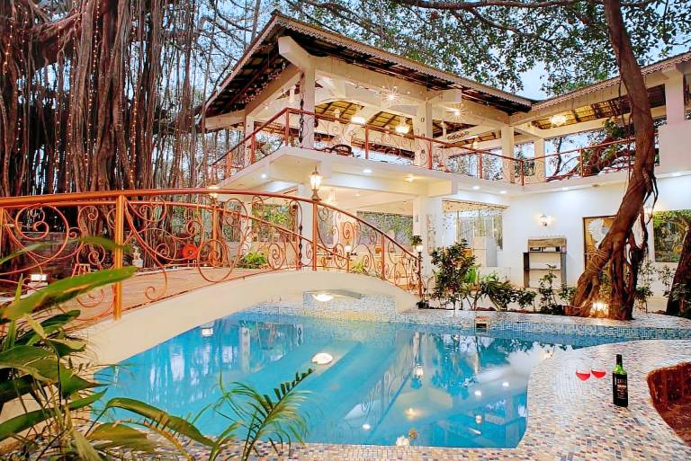 Serviced apartment with garden, pool & patio in Morjim
