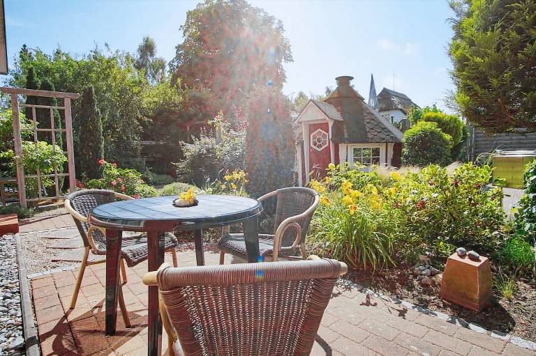ruhig gelegene Ferienwohnung - Ferienhaus Weingarten FeWo zum Bodden — photo 4