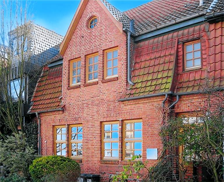 Zentrale Wohnung mit Klavier Kunst und Design