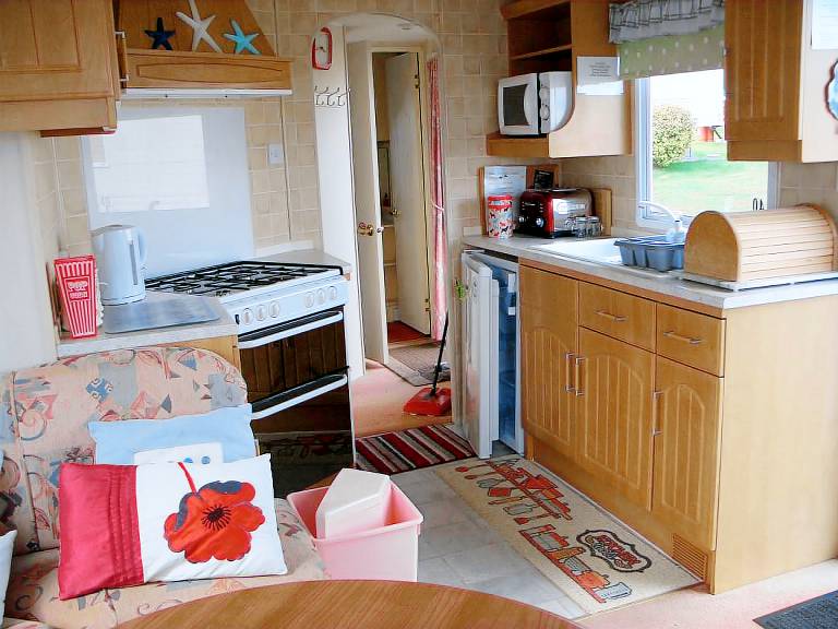 Mobile home with yard | Garden view — photo 5