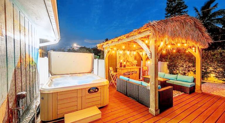 NEW! Blue Iguana! Tropical backyard oasis with heated pool, hot tub, fire table, and more! — photo 3