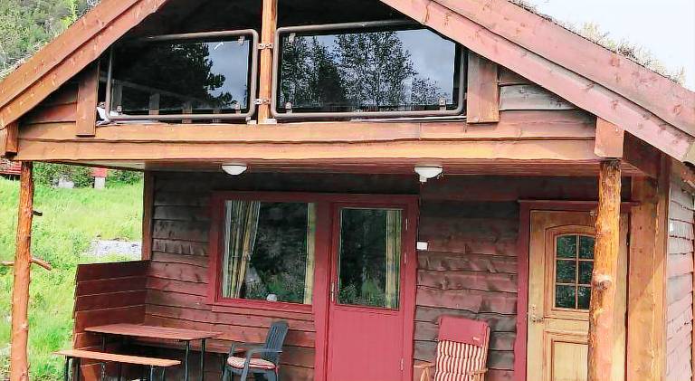 Holiday apartment with terrace, barbeque & yard in Sunnfjord