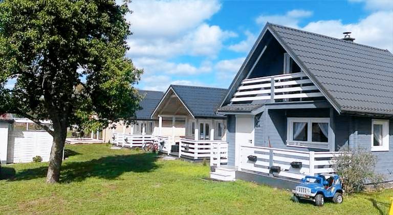 Vacation home with hot tub, yard & patio in Miedzyzdroje