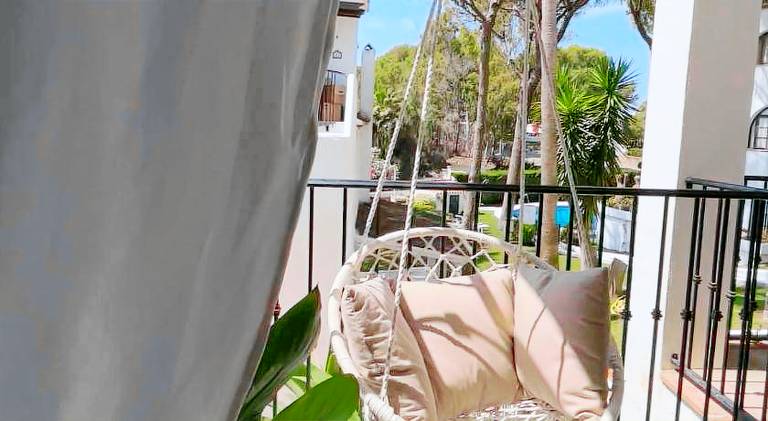Holiday apartment with pool, yard & terrace in Marbella